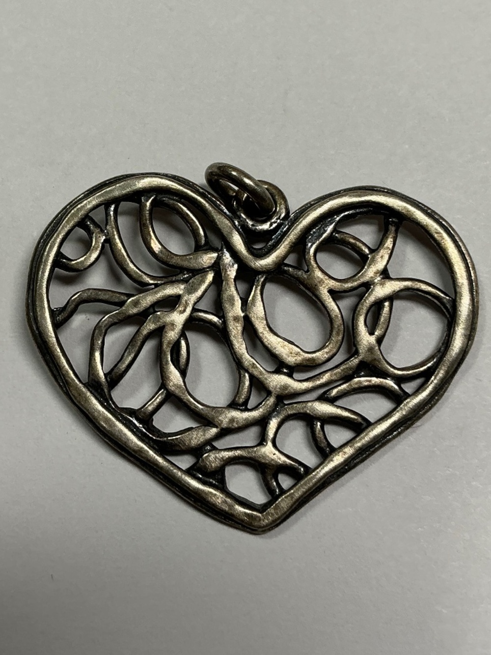 Sterling Silver Filigree Heart Shaped Pendant. 1 inch high